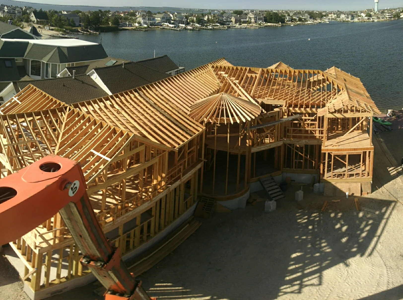 Large waterfront framing progress viewed from outside