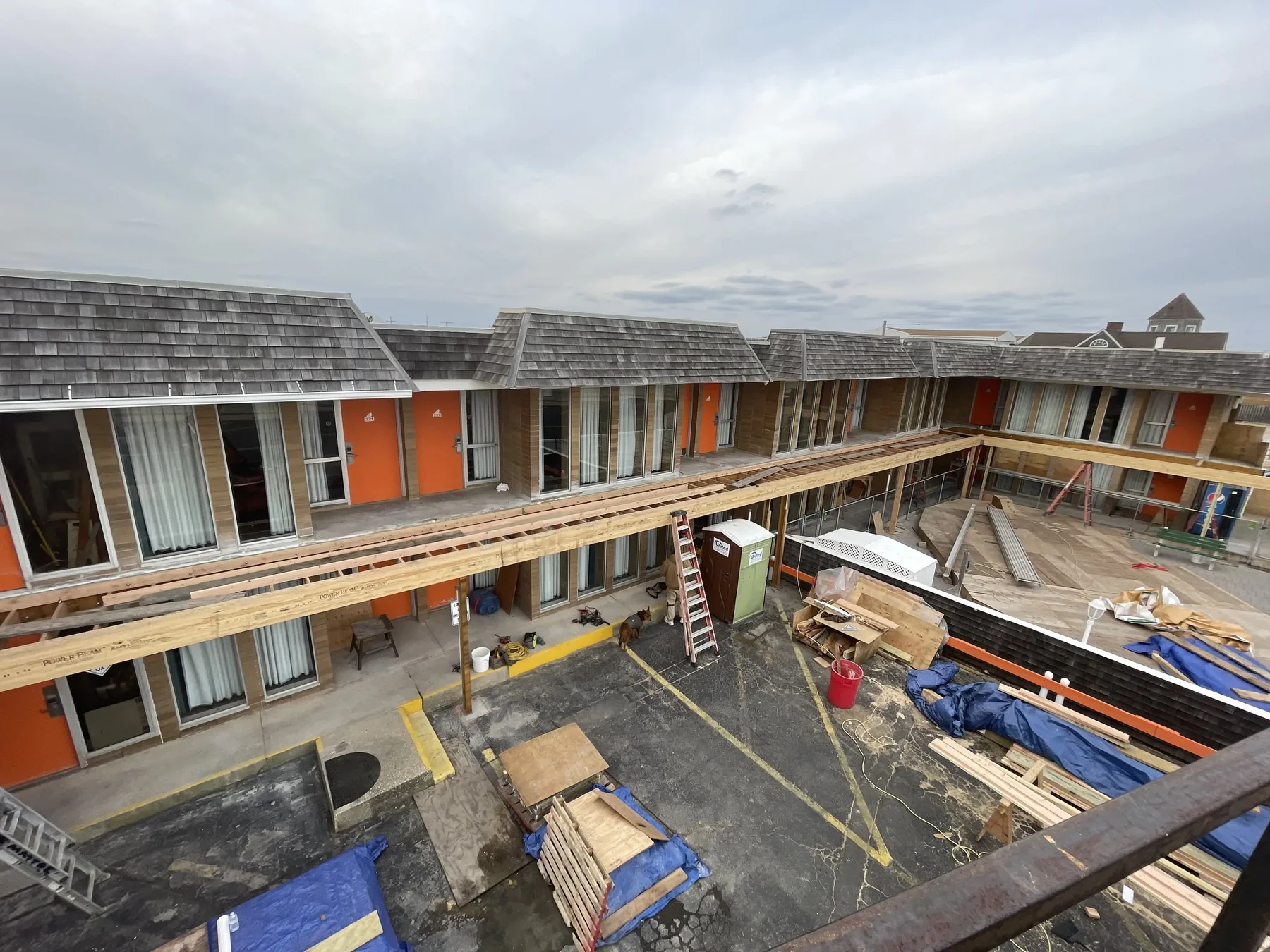 Long motel catwalk and deck framing rebuild in progress