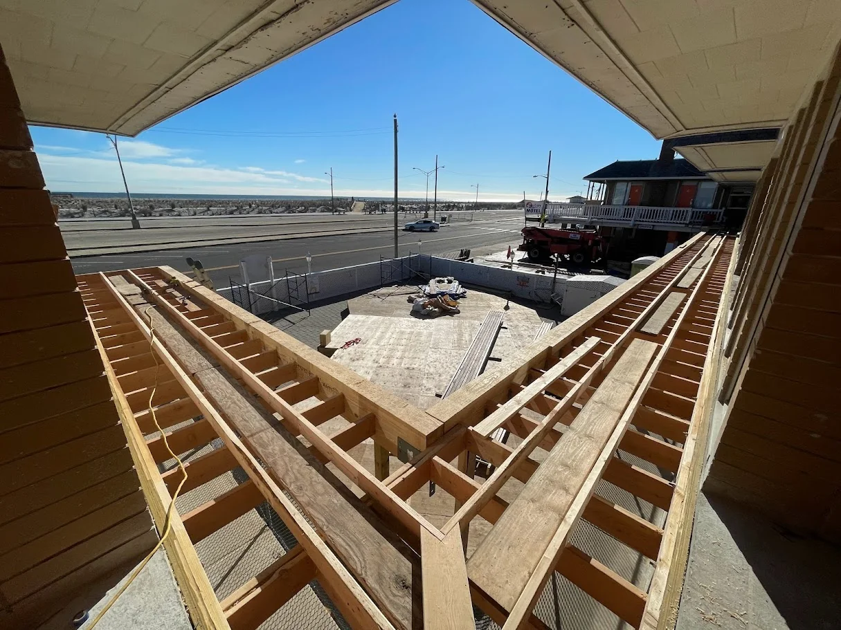 Ocean-facing deck and balcony framing viewed from above